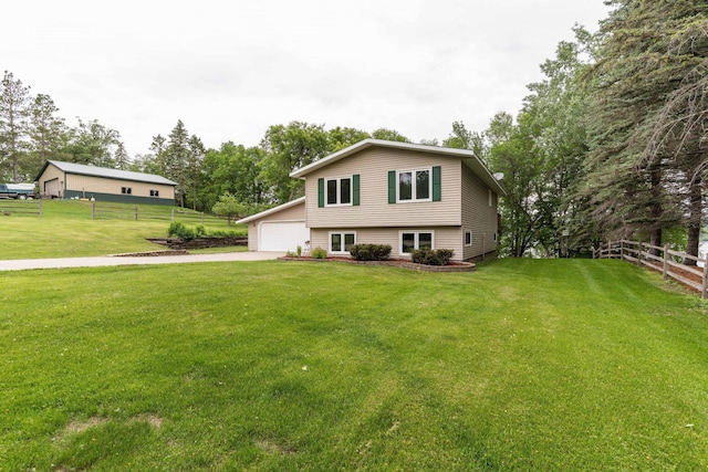 20619 Hillcrest Rd, Elizabeth Twp, MN 56537 - tri-level home featuring view of scattered trees and a garage
