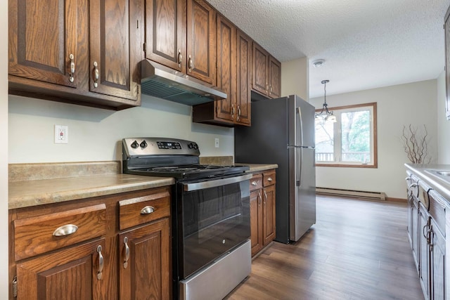 20619 Hillcrest Rd, Elizabeth Twp, MN 56537 - kitchen featuring appliances with stainless steel finishes, under cabinet range hood, baseboard heating, wood finished floors, and light countertops