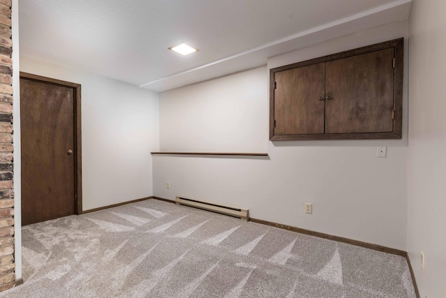 20619 Hillcrest Rd, Elizabeth Twp, MN 56537 - carpeted empty room with a baseboard radiator and baseboards