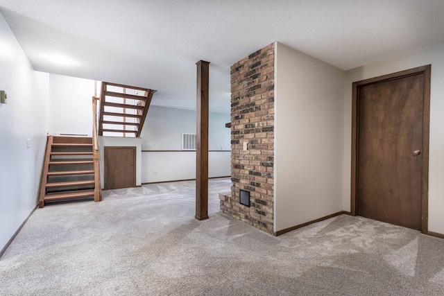 20619 Hillcrest Rd, Elizabeth Twp, MN 56537 - unfurnished living room with stairway, carpet, baseboards, and a textured ceiling