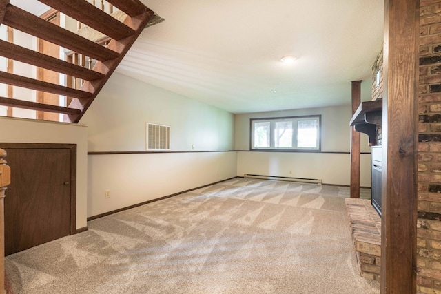 20619 Hillcrest Rd, Elizabeth Twp, MN 56537 - unfurnished living room featuring baseboard heating, carpet flooring, and baseboards