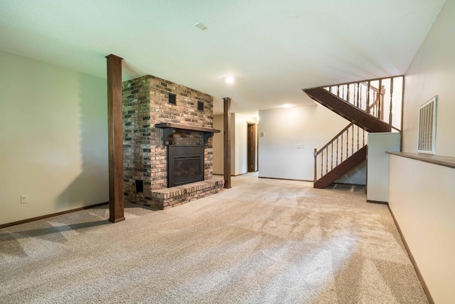 20619 Hillcrest Rd, Elizabeth Twp, MN 56537 - unfurnished living room with carpet floors, stairs, a fireplace, and baseboards