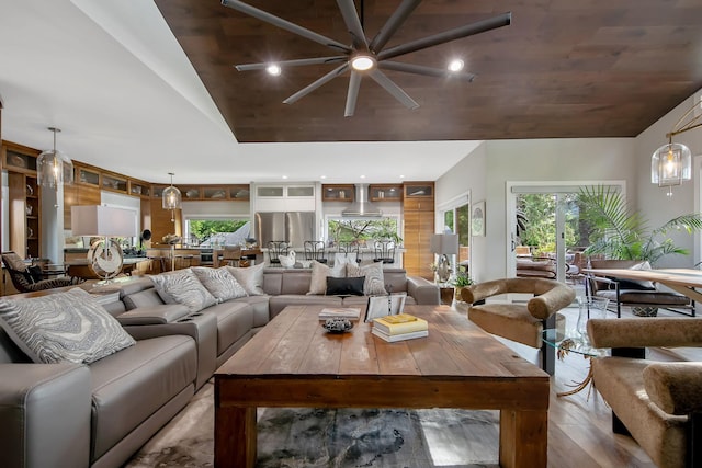 2311 Swan Dr, Mendota Heights, MN 55120 - living room featuring vaulted ceiling, light wood-style flooring, and a ceiling fan