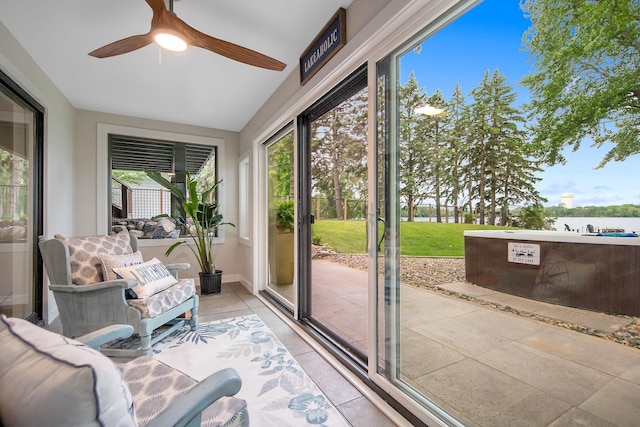 2311 Swan Dr, Mendota Heights, MN 55120 - sunroom / solarium featuring tile patterned floors, lofted ceiling, and baseboards
