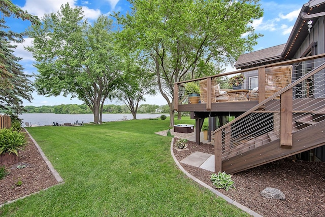 2311 Swan Dr, Mendota Heights, MN 55120 - view of grassy yard with a deck with water view and stairs