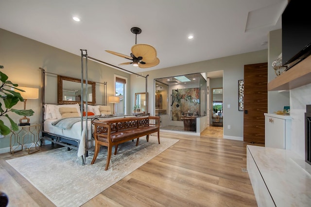 2311 Swan Dr, Mendota Heights, MN 55120 - bedroom with light wood-type flooring, baseboards, and recessed lighting