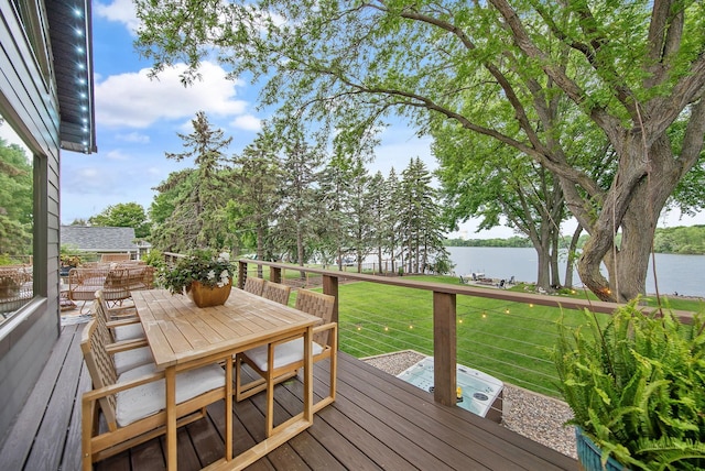 2311 Swan Dr, Mendota Heights, MN 55120 - wooden deck with a water view, a lawn, and outdoor dining space