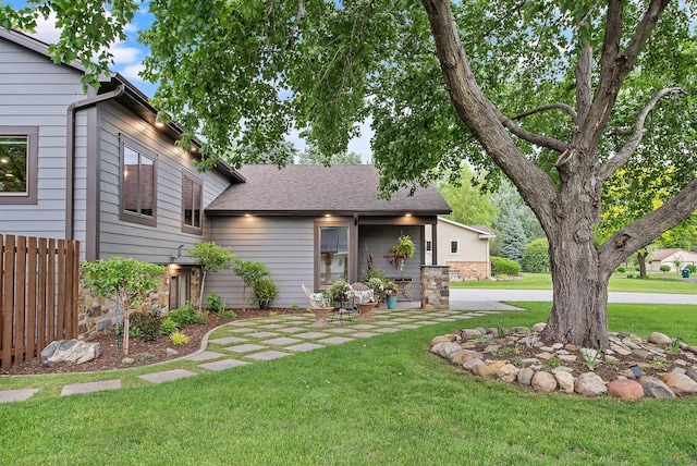 2311 Swan Dr, Mendota Heights, MN 55120 - view of front facade featuring stone siding and roof with shingles