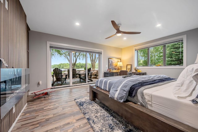 2311 Swan Dr, Mendota Heights, MN 55120 - bedroom with access to outside, light wood-type flooring, recessed lighting, and a ceiling fan