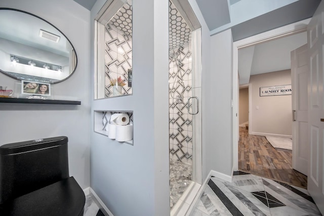 2311 Swan Dr, Mendota Heights, MN 55120 - bathroom with a stall shower and baseboards