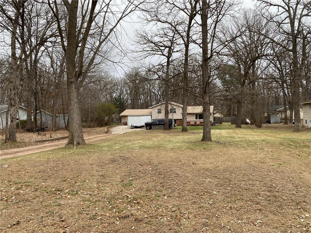 18747 146th St NW, Elk River, MN 55330 - view of green lawn featuring driveway