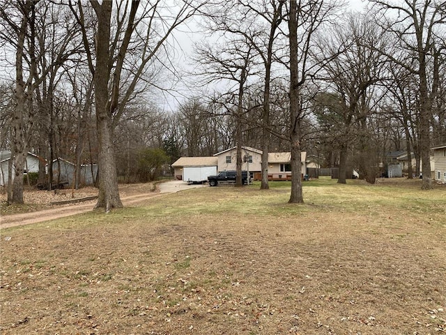18747 146th St NW, Elk River, MN 55330 - view of green lawn featuring driveway
