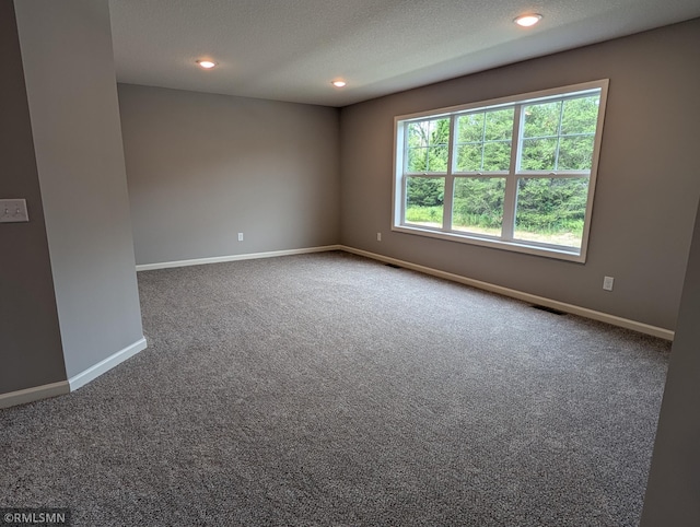6785 104th St S, Cottage Grove, MN 55016 - unfurnished room featuring carpet and recessed lighting