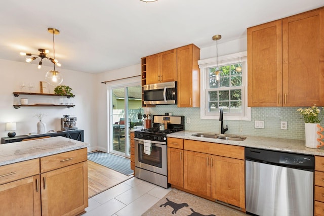 6233 4th Ave S, Richfield, MN 55423 - kitchen with stainless steel appliances, open shelves, a sink, and tasteful backsplash