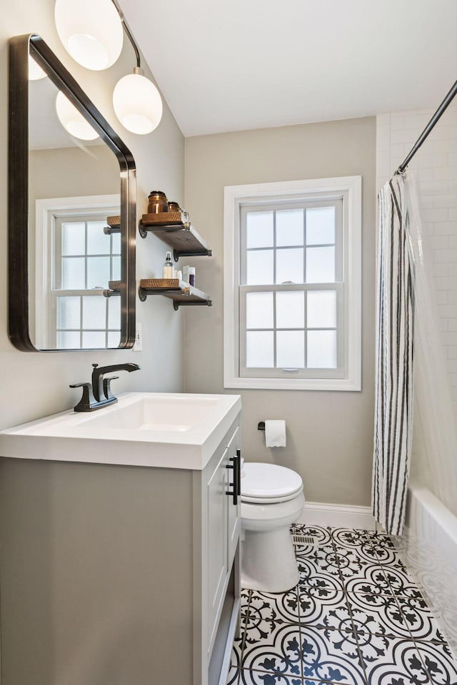 6233 4th Ave S, Richfield, MN 55423 - full bath with vanity, toilet, plenty of natural light, and shower / bath combo