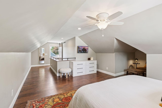 6233 4th Ave S, Richfield, MN 55423 - bedroom with dark wood finished floors, baseboards, vaulted ceiling, and ceiling fan