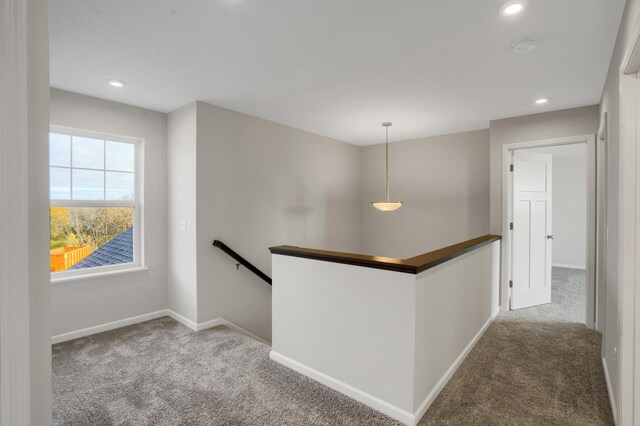 10647 29th St NE, Saint Michael, MN 55376 - hallway with an upstairs landing, carpet, baseboards, and recessed lighting