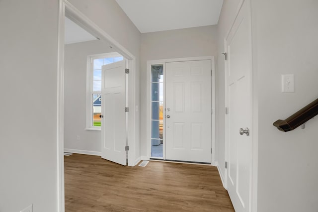 10647 29th St NE, Saint Michael, MN 55376 - foyer featuring wood finished floors and baseboards