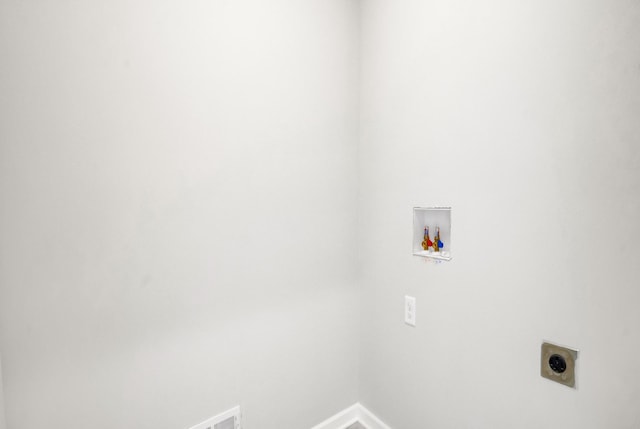 10647 29th St NE, Saint Michael, MN 55376 - washroom with hookup for an electric dryer, baseboards, and washer hookup
