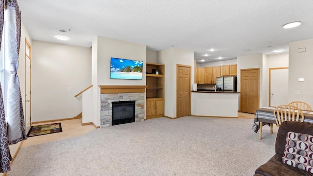 13749 Atrium Ave Unit 2303, Rosemount, MN 55068 - living area featuring light carpet, baseboards, a textured ceiling, and recessed lighting