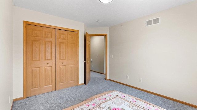 13749 Atrium Ave Unit 2303, Rosemount, MN 55068 - carpeted bedroom featuring a closet and baseboards