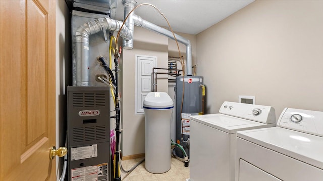 13749 Atrium Ave Unit 2303, Rosemount, MN 55068 - laundry area featuring washer and dryer, water heater, heating unit, and light tile patterned floors