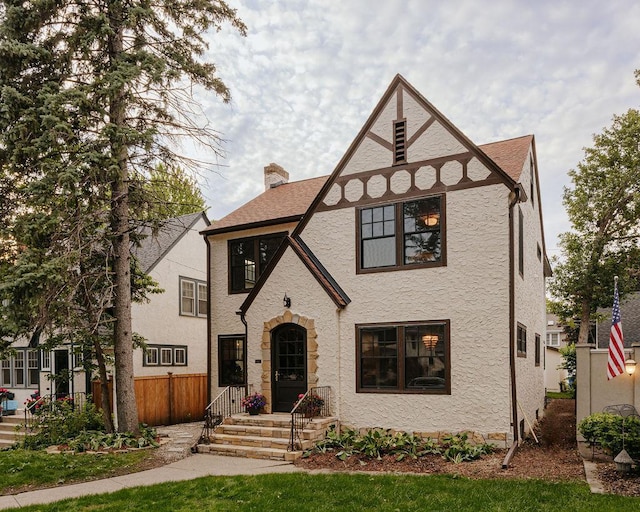 2137 Wellesley Ave, Saint Paul, MN 55105 - english style home featuring a chimney and stucco siding