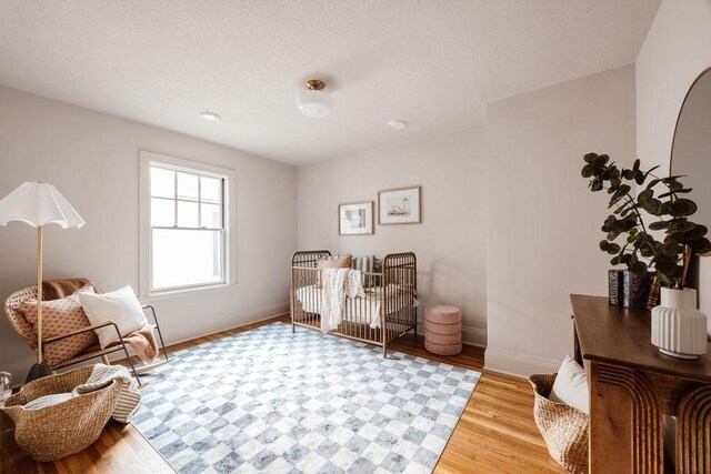 2137 Wellesley Ave, Saint Paul, MN 55105 - living area featuring wood finished floors and baseboards