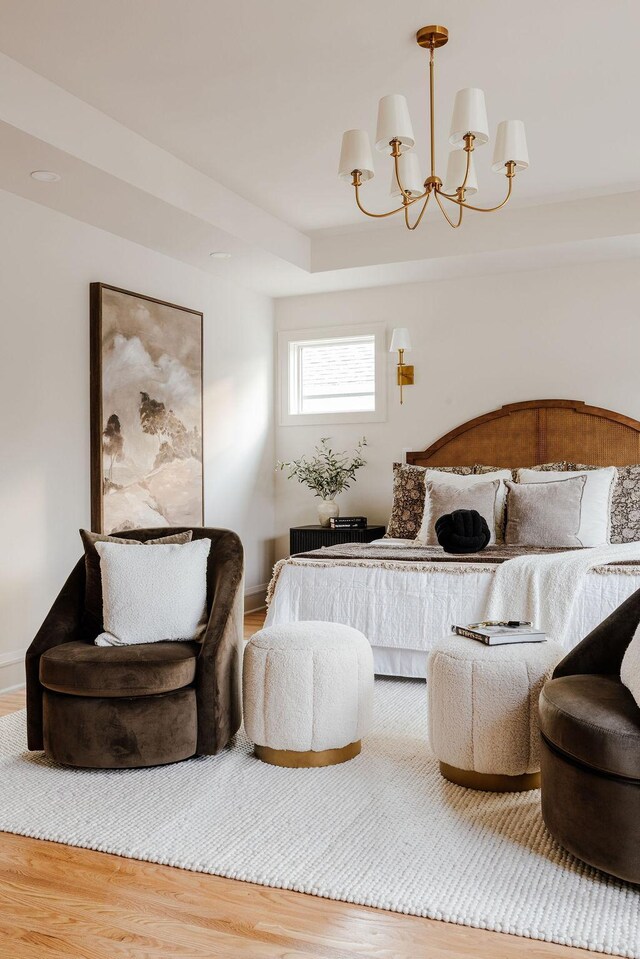 2137 Wellesley Ave, Saint Paul, MN 55105 - sitting room featuring wood finished floors and a chandelier