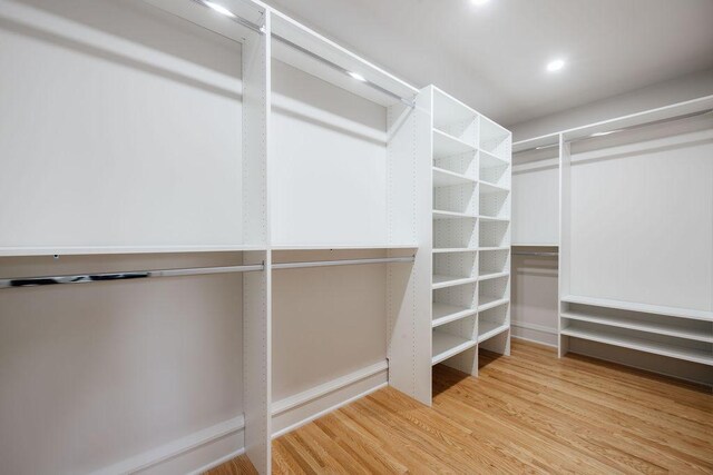 2137 Wellesley Ave, Saint Paul, MN 55105 - walk in closet featuring wood finished floors