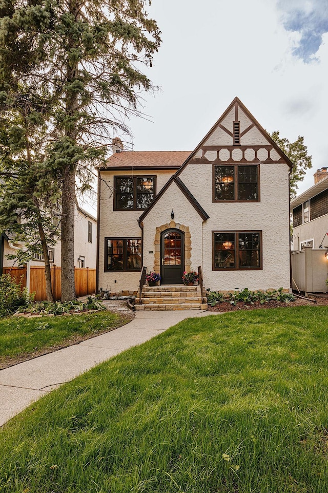 2137 Wellesley Ave, Saint Paul, MN 55105 - tudor home featuring a chimney and stucco siding