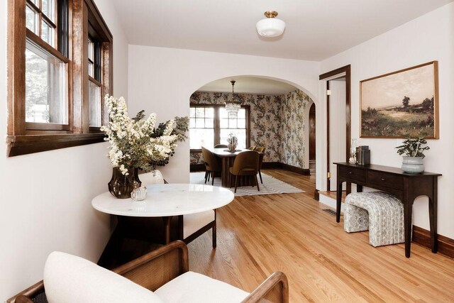 2137 Wellesley Ave, Saint Paul, MN 55105 - living area with arched walkways and light wood-type flooring