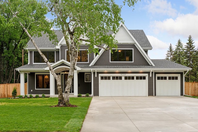 5924 Drew Ave S, Edina, MN 55410 - view of front of house with driveway, a shingled roof, and an attached garage