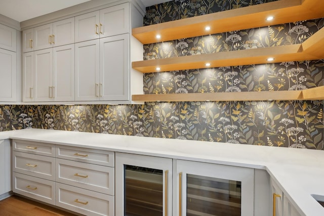 5924 Drew Ave S, Edina, MN 55410 - bar area featuring wallpapered walls and beverage cooler