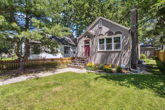 4545 5th Ave S, Minneapolis, MN 55419 - view of front of property with a chimney and stucco siding