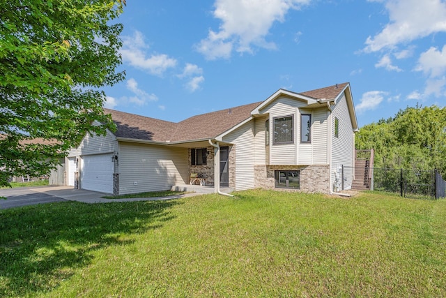 6122 152nd St N, Hugo, MN 55038 - tri-level home with a garage, asphalt driveway, and a shingled roof