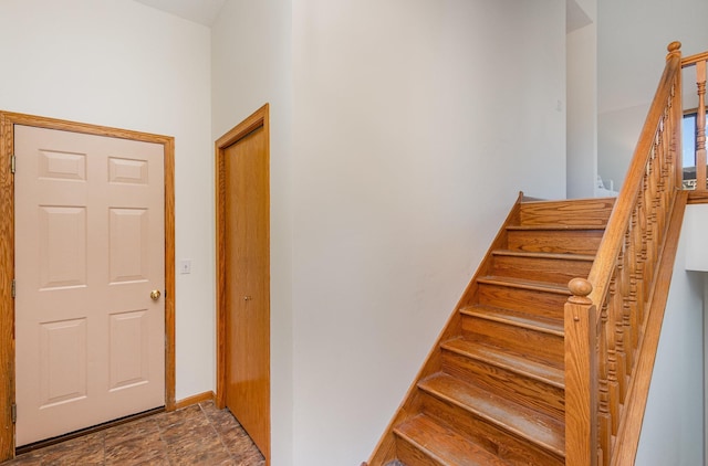 6122 152nd St N, Hugo, MN 55038 - stairs featuring baseboards and stone finish flooring