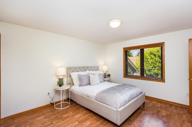 6122 152nd St N, Hugo, MN 55038 - bedroom featuring light wood finished floors and baseboards
