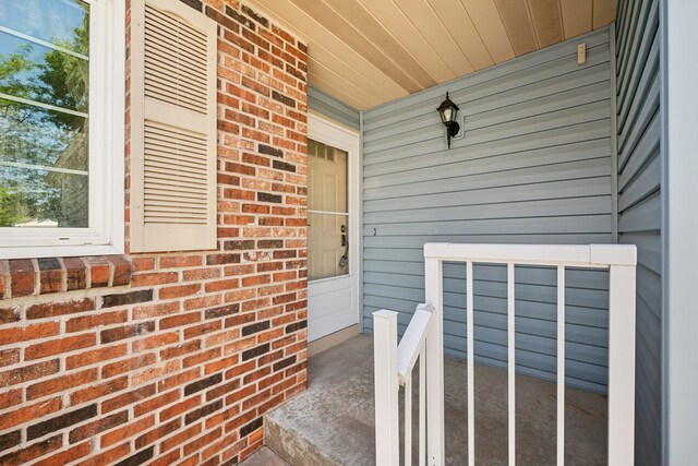 2639 Lake Court Cir Unit 81, Mounds View, MN 55112 - entrance to property with a porch and brick siding