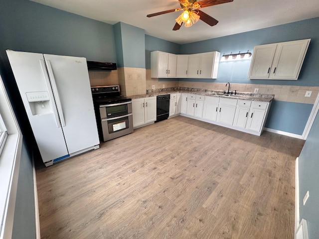 301 Legion Field Rd, Marshall, MN 56258 - kitchen with double oven range, white refrigerator with ice dispenser, black dishwasher, range hood, and a sink