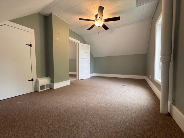301 Legion Field Rd, Marshall, MN 56258 - bonus room featuring vaulted ceiling, carpet, a ceiling fan, and baseboards
