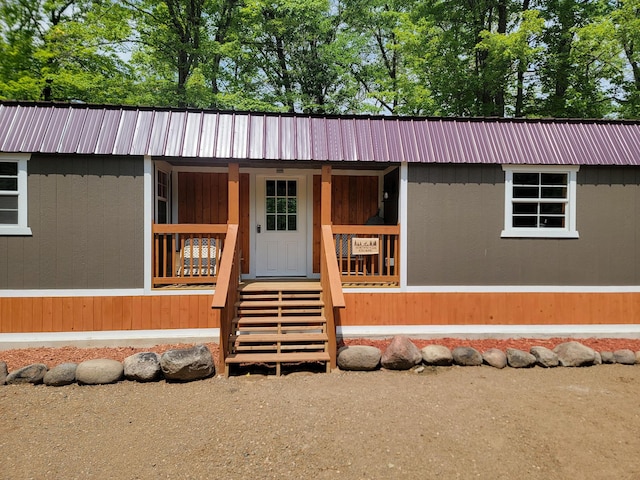 46625 High Dr, Kathio Twp, MN 56450 - view of front facade with covered porch and metal roof