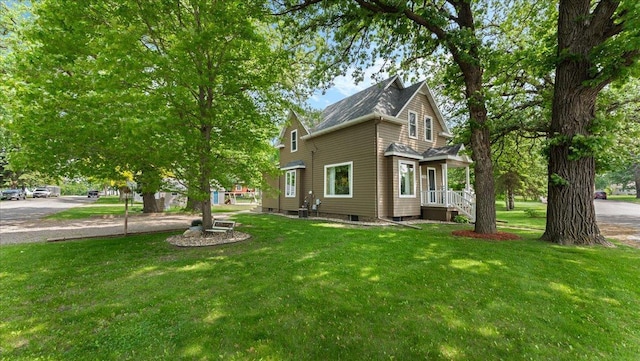 401 Main St, Osakis, MN 56360 - view of property exterior featuring a lawn