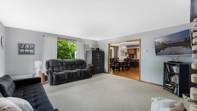 401 Main St, Osakis, MN 56360 - carpeted living room featuring baseboards