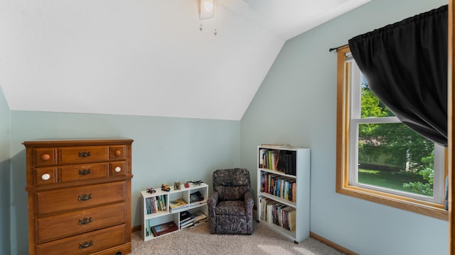 401 Main St, Osakis, MN 56360 - sitting room featuring light carpet, lofted ceiling, and a ceiling fan