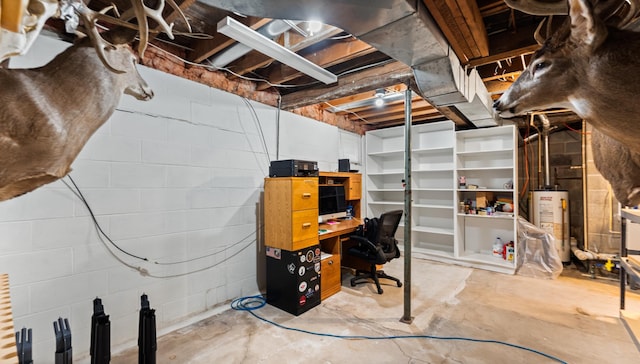 401 Main St, Osakis, MN 56360 - unfinished basement with gas water heater and a desk