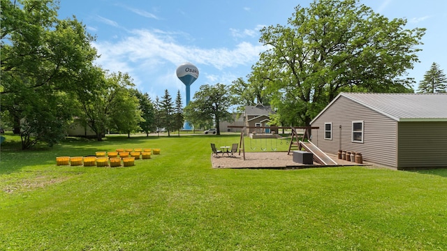 401 Main St, Osakis, MN 56360 - view of grassy yard with a playground