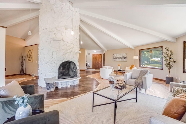 1000 Winston Cir, Mendota Heights, MN 55118 - living room with wood finished floors, baseboards, and a fireplace