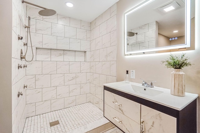 1000 Winston Cir, Mendota Heights, MN 55118 - full bathroom featuring vanity, a tile shower, and recessed lighting