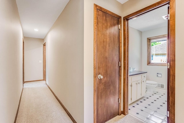 1000 Winston Cir, Mendota Heights, MN 55118 - hallway featuring light colored carpet and baseboards